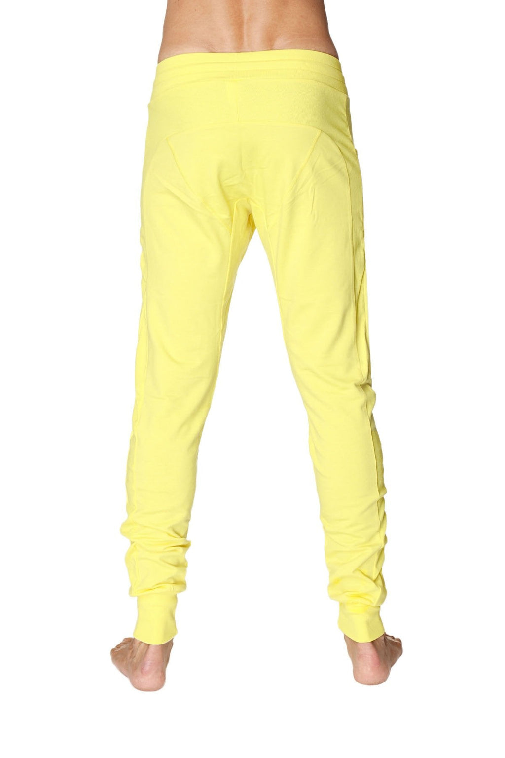 Bright yellow soft fabric long cuffed jogger and yoga sweat pants with relaxed fit and ruched cuffs