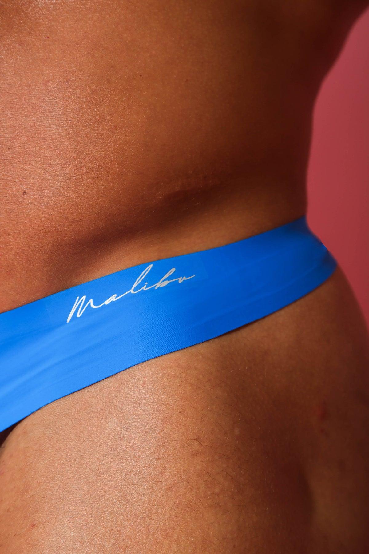 Bright blue malibu seamless thong bikini bottom with sleek smooth fabric waistband in sapphire blue