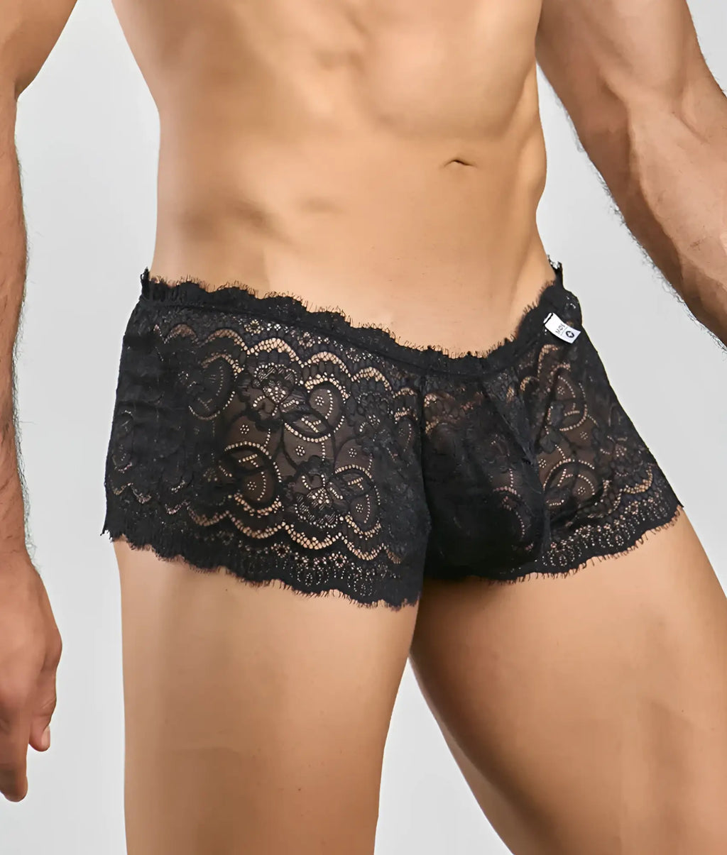 Black lace boxer shorts with intricate floral patterns and scalloped edge in a lace boxer short rose design
