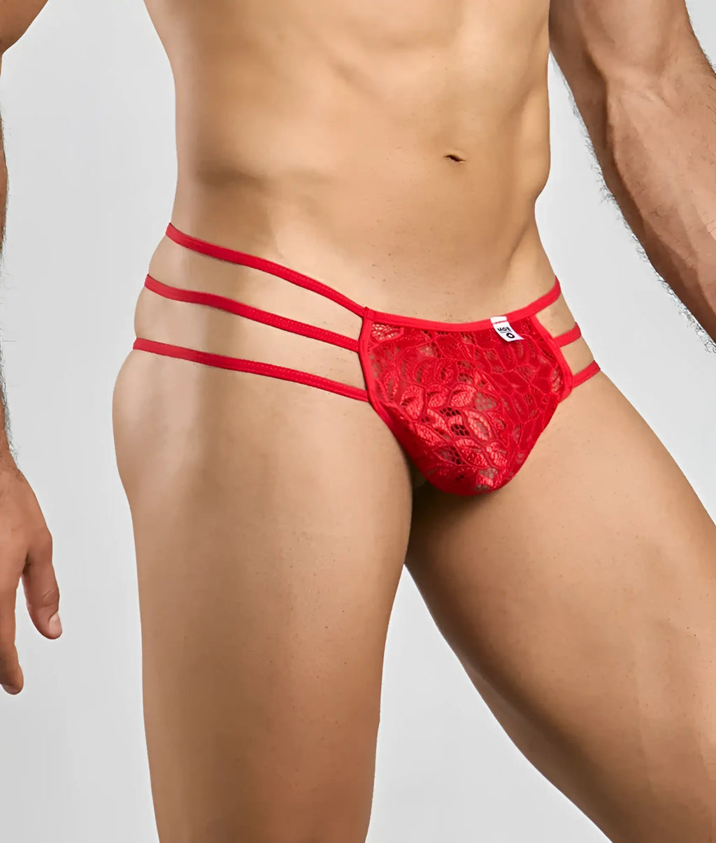 Red lace MOB men’s pouch thong featuring three horizontal straps and a lace material design