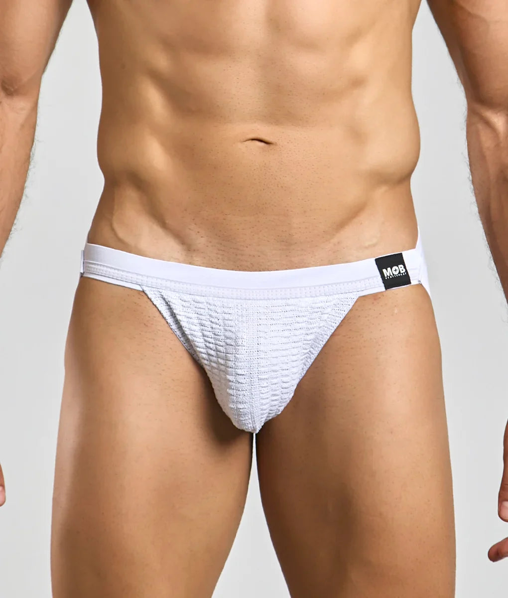 White textured briefs with black mor brand tag on waistband for mob swim jockstrap front view