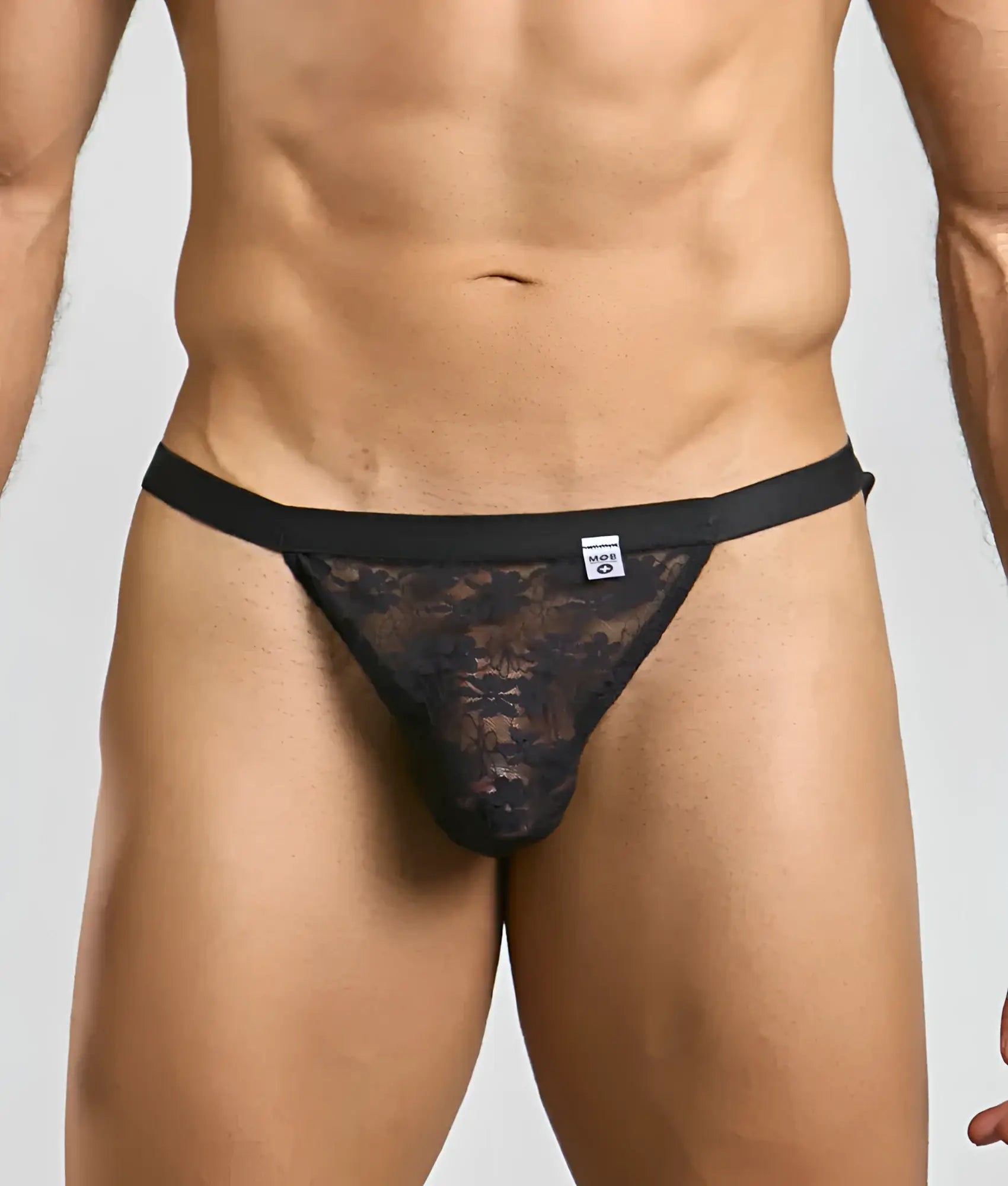 Black lace MOB Y sexy thong with solid black waistband and floral pattern shown from the back side