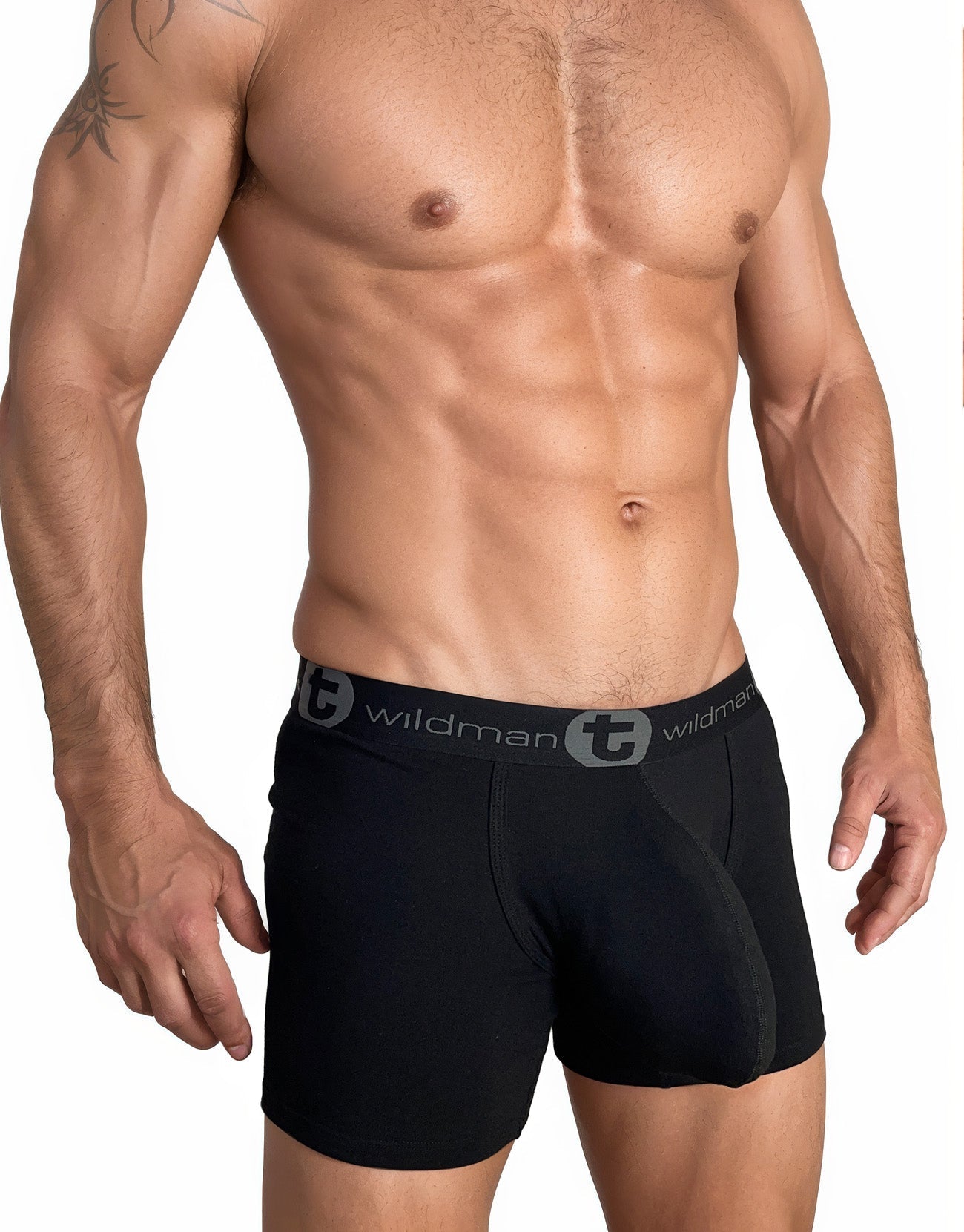 WildmanT black cotton boxer briefs with a 5-inch inseam and branded elastic waistband, worn by a muscular man.