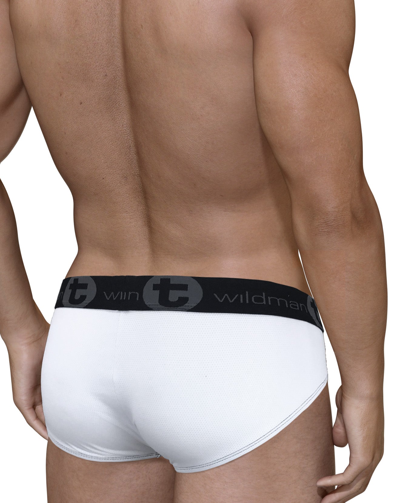 Back view of a man wearing white mesh briefs with a black elastic waistband featuring the WildmanT logo.