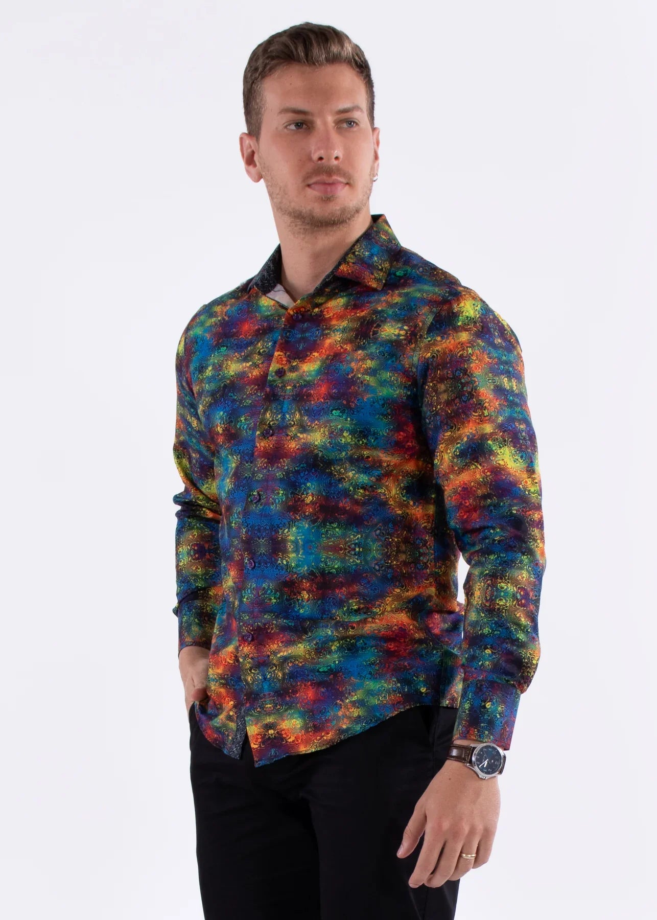 Vibrant multicolor patterned long-sleeved men’s button-down shirt with psychedelic tie-dye in blues reds yellows and greens