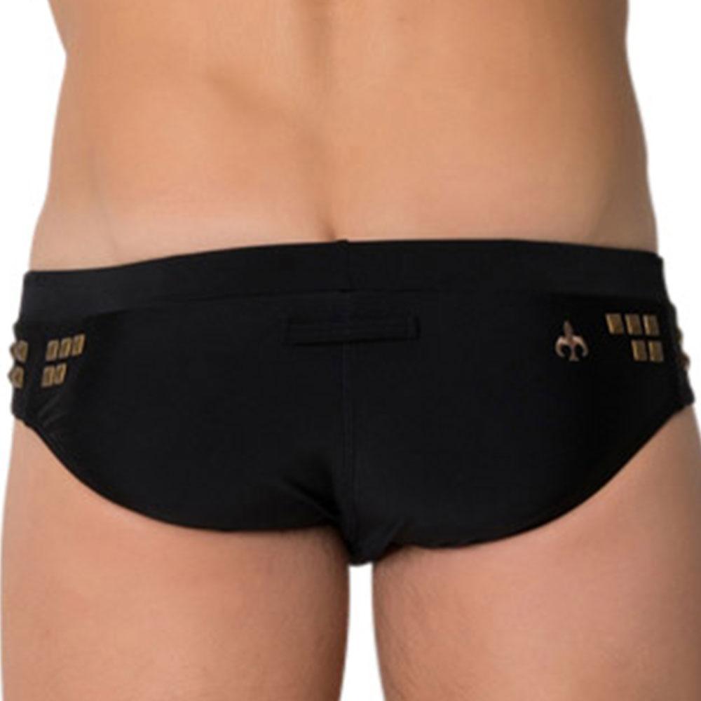 Black Marcuse MA_Stud swimwear trunks with gold metallic embellishments and fleur-de-lis logo on the side