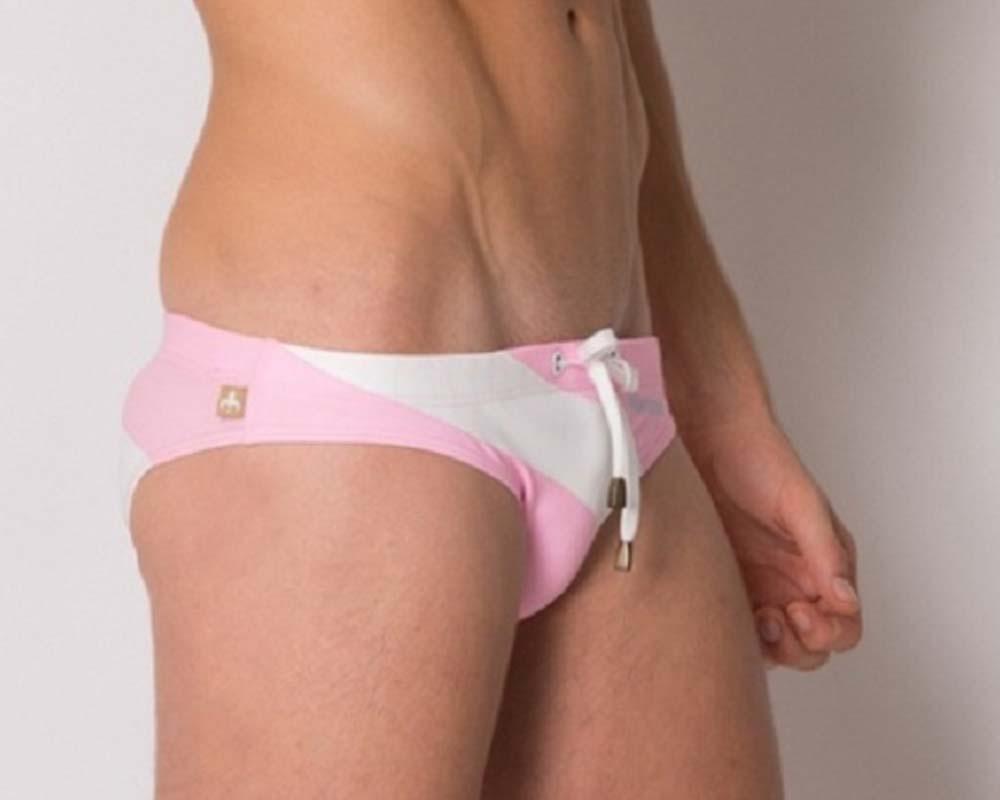 Pink and white Marcuse MA_Xtreme swim trunks with drawstring waistband designed for beachwear and swimming