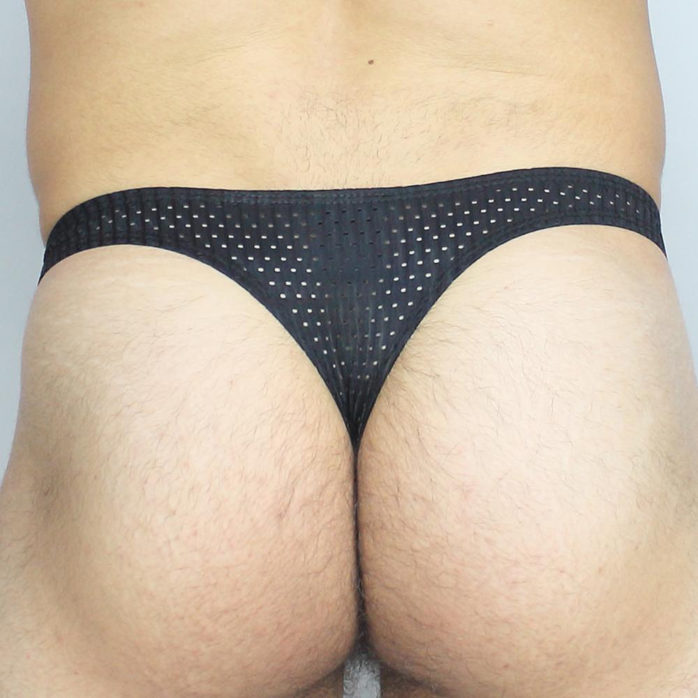 Black mesh thong with perforated design from Mckillop GGPL Gravity Enhance thong expose showcasing breathable fabric