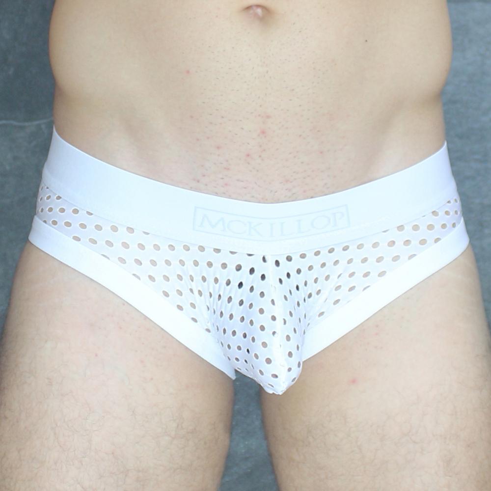White mesh briefs with solid white waistband branded montlon mckillop mckobhq brief for comfortable wear