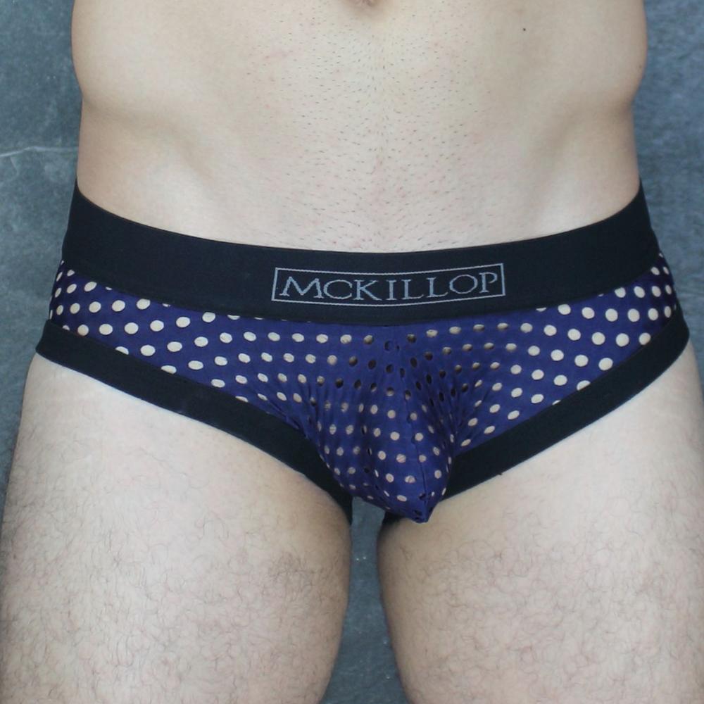Dark blue mesh briefs with white polka dots and black elastic waistband featuring mckillop logo Mckillop MCKOBHQ Brief