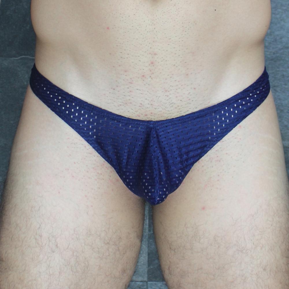 Navy blue mesh Mckillop MCKVTPL thong briefs with textured breathable fabric and a snug fit showing the back side