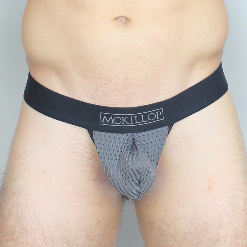 Black and gray mesh thong with branded waistband featuring mckillop mppl max bulge pouch expose design