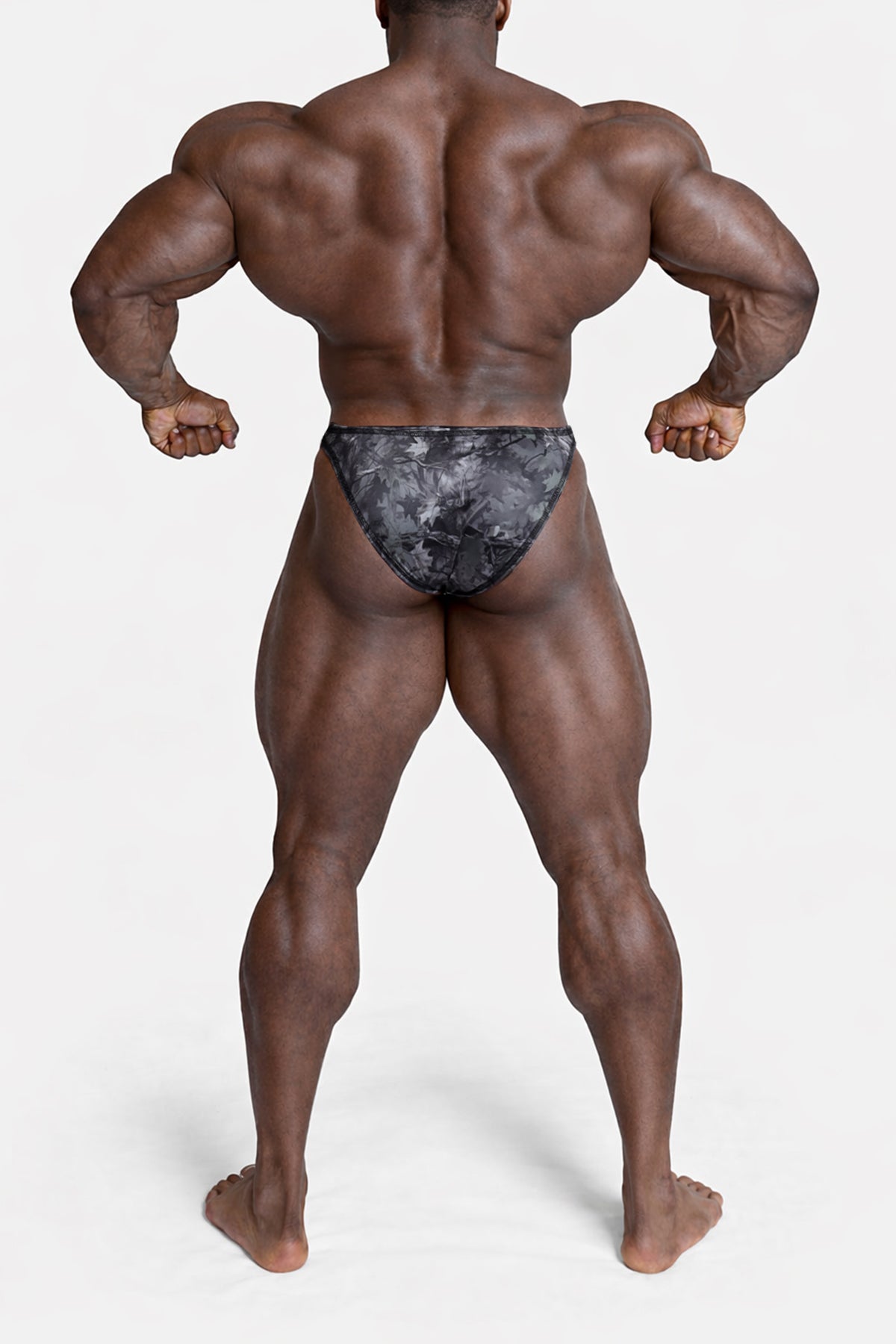Men’s bodybuilding posing trunks in black and gray camouflage pattern designed for competition use