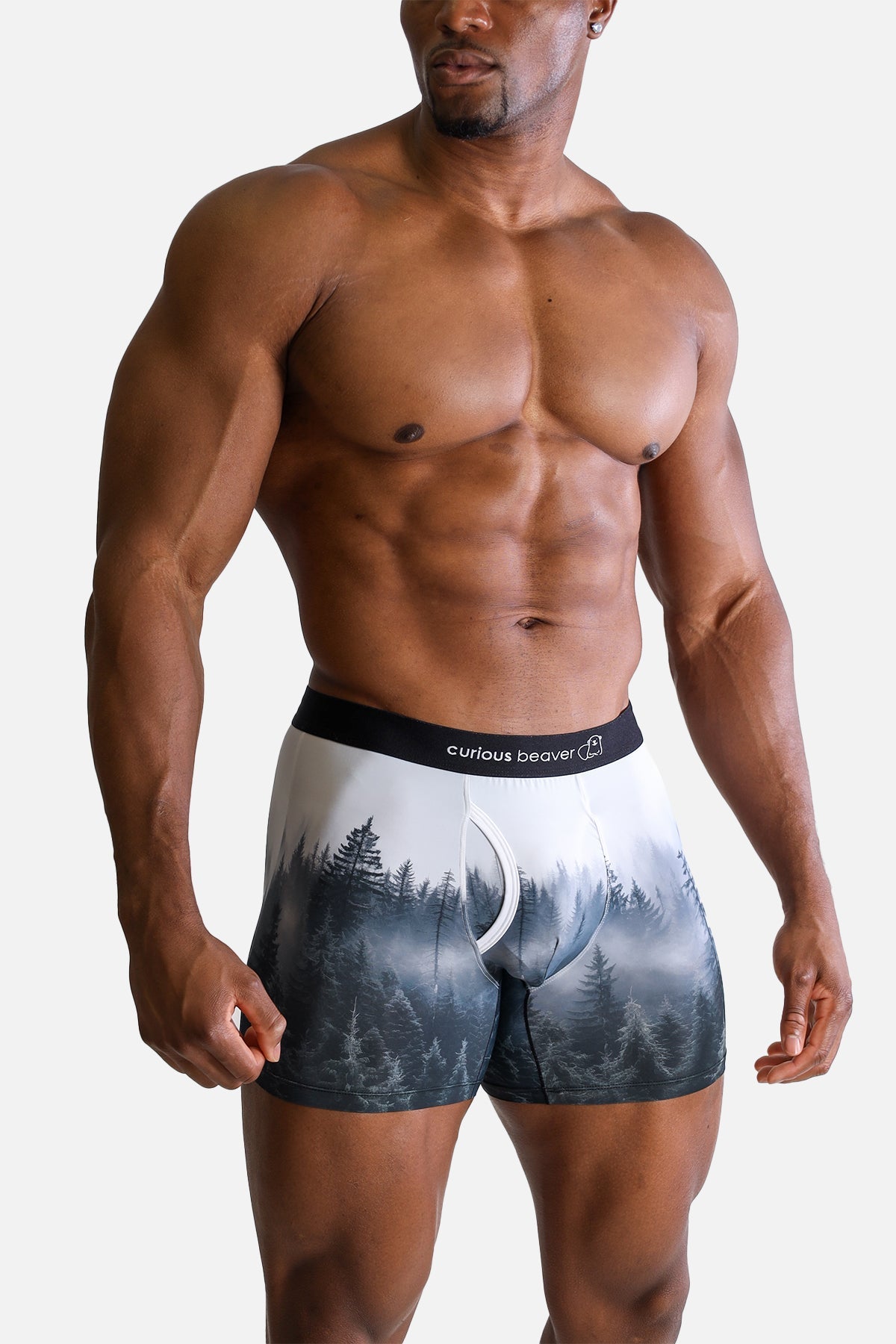 Men’s black and white forest-themed boxer briefs with curious beaver brand label on the waistband