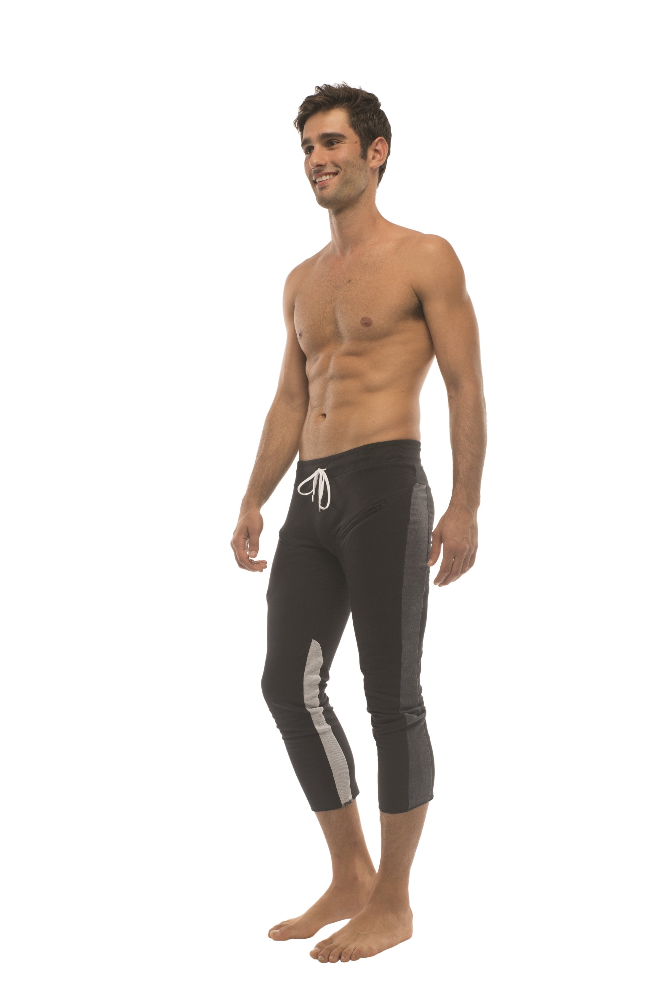 Mens 4/5 zipper pocket capri yoga pants in black with charcoal gray side stripes and white drawstring for comfort