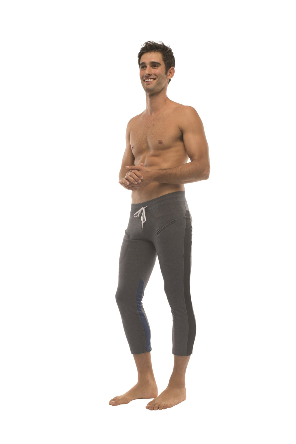 Mens charcoal capri yoga pants with gray drawstring waistband and subtle side pockets for athletic use