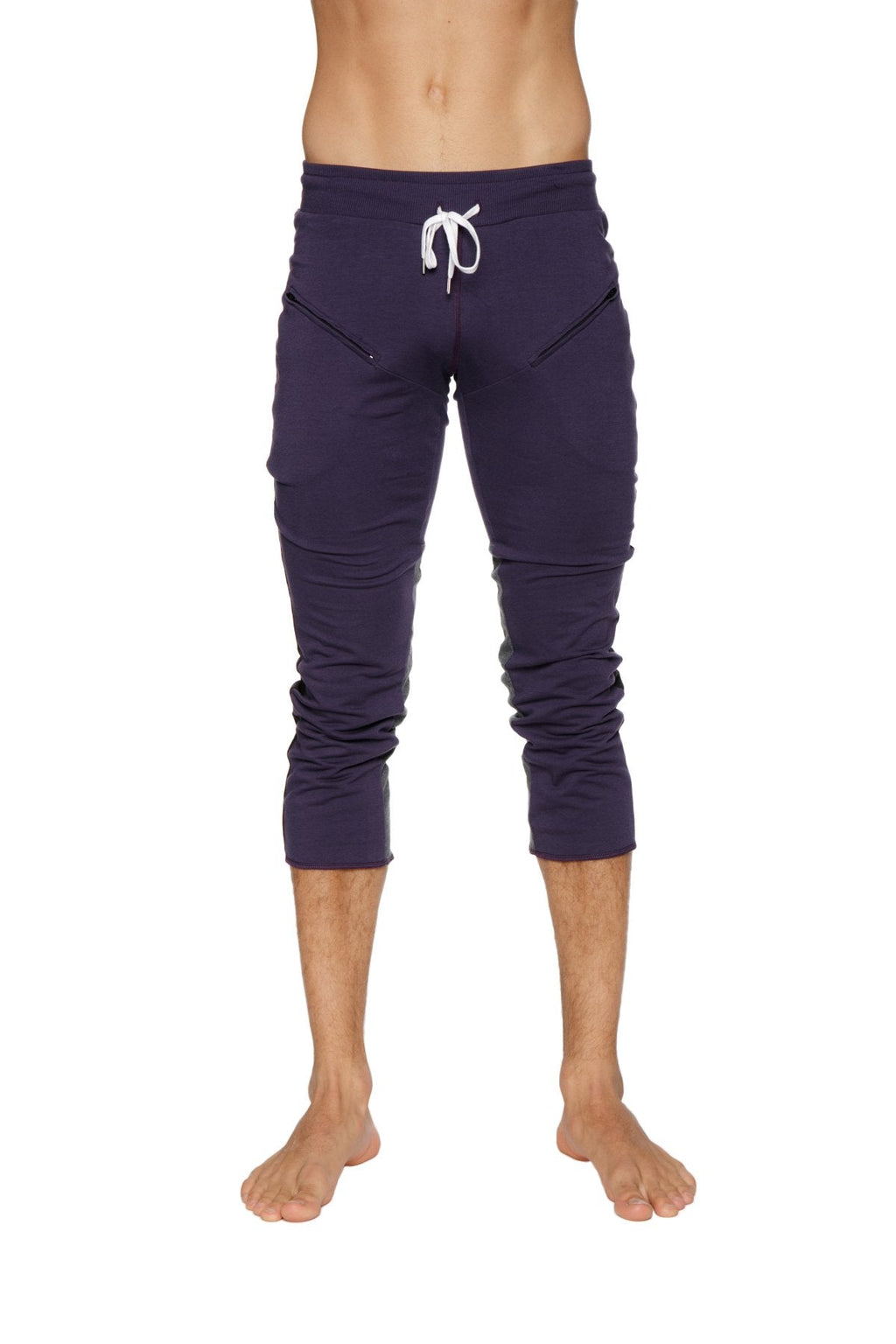 Mens navy blue capri length athletic pants with white drawstring waistband and side pockets for active wear