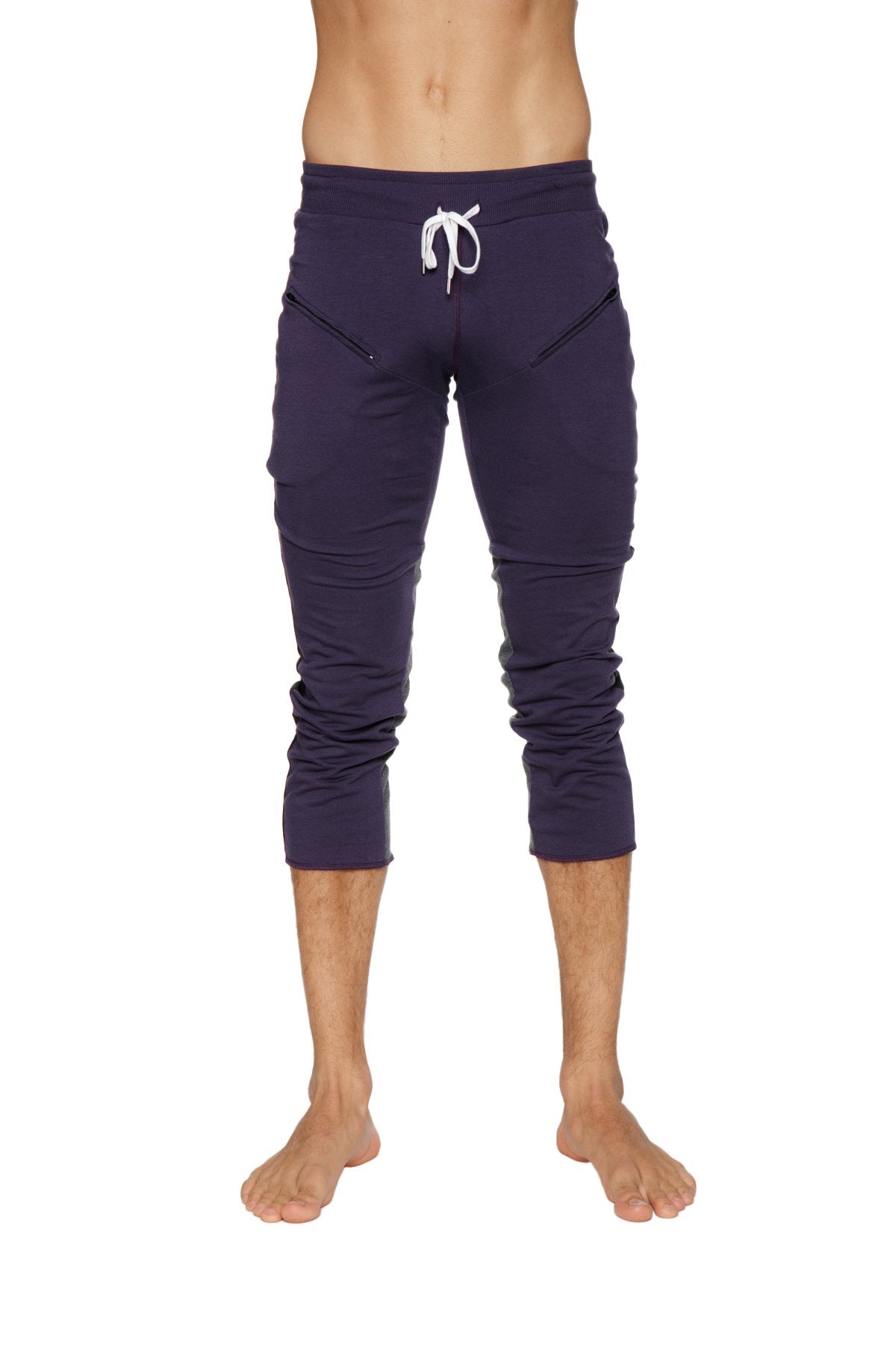 Mens navy blue capri length athletic pants with white drawstring waistband and side pockets for active wear