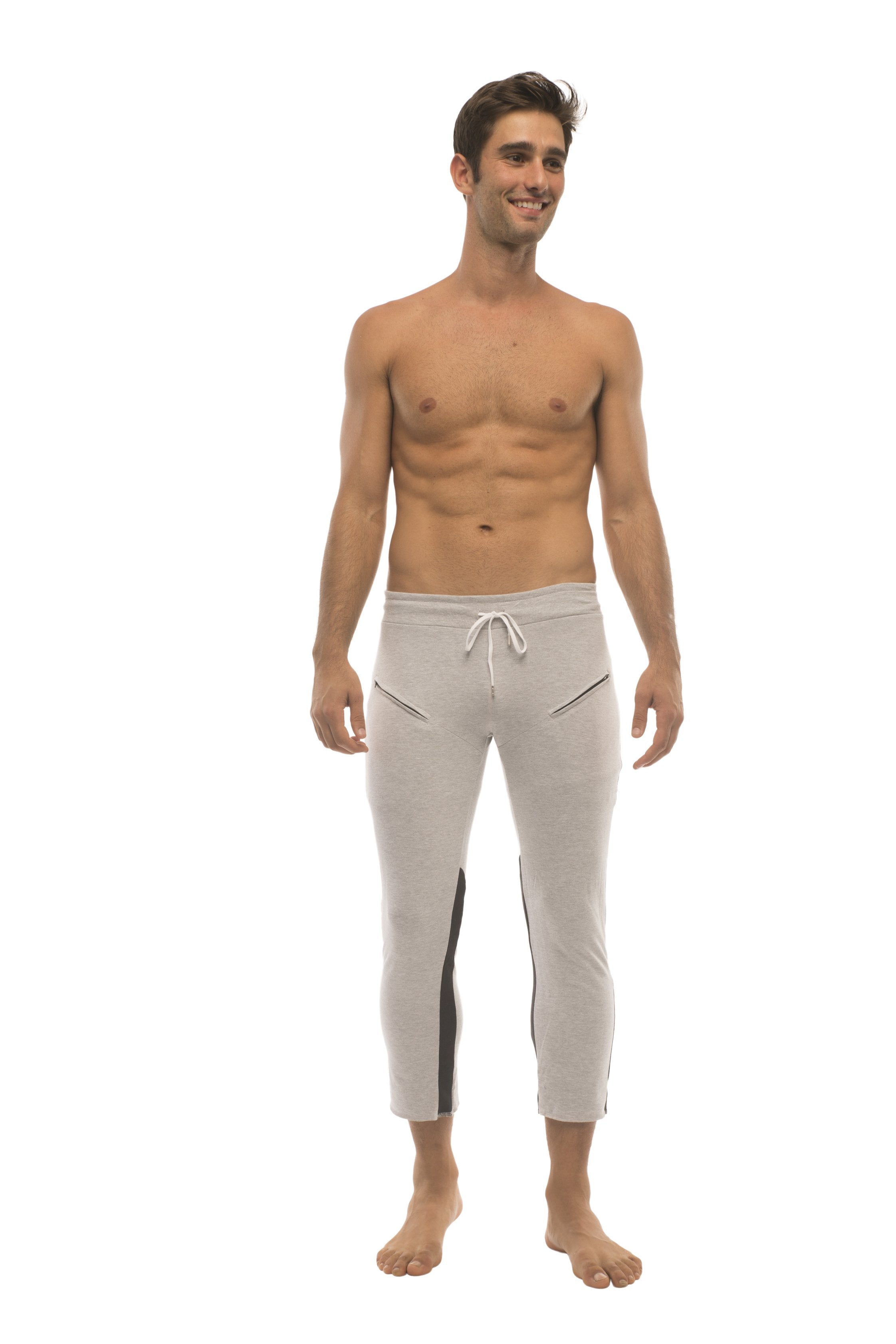 Mens 4/5 zipper pocket capri yoga pants in light gray with black side stripes and white drawstring waistband