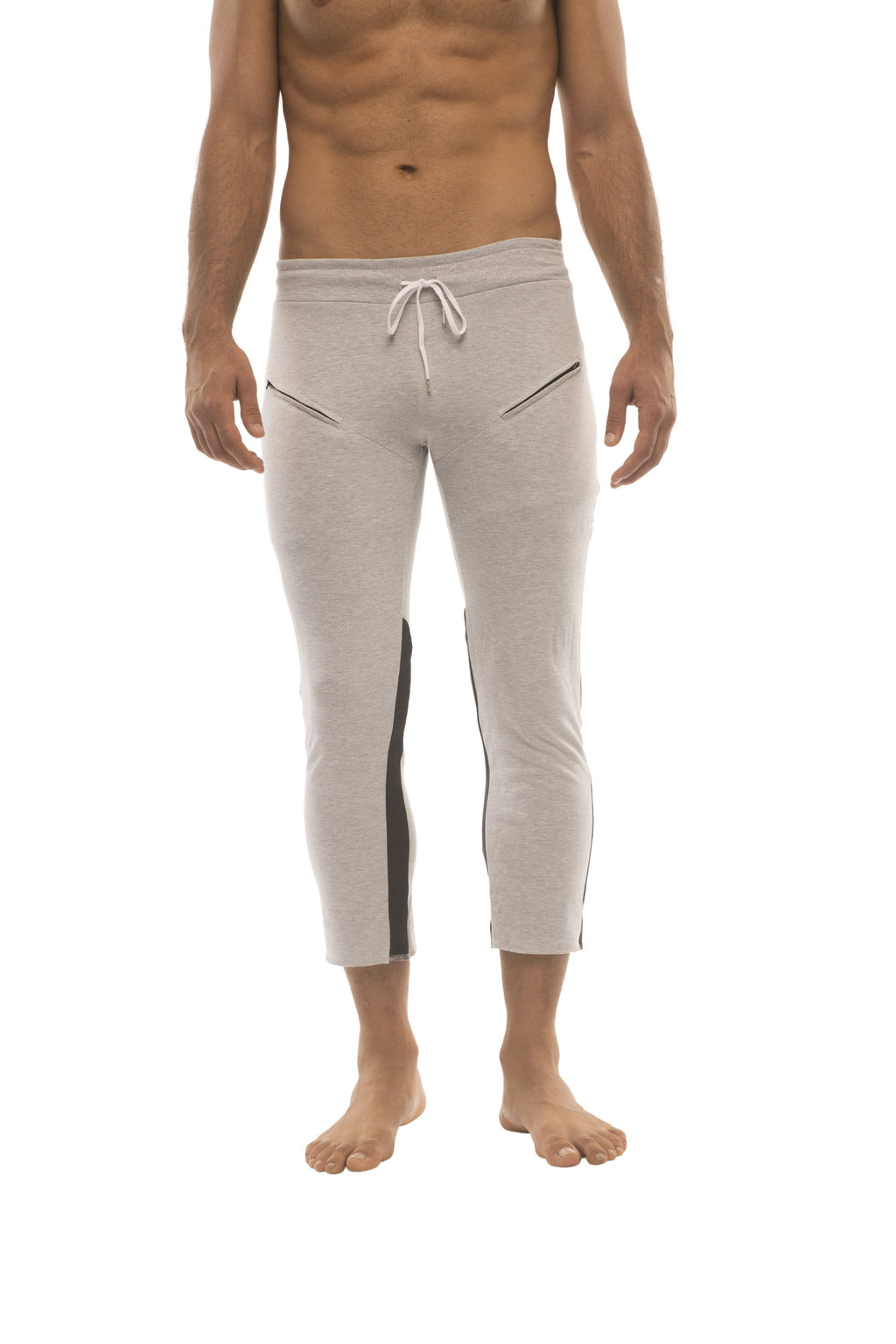 Mens grey capri yoga pants with black side stripes white drawstring waistband and zipper pockets