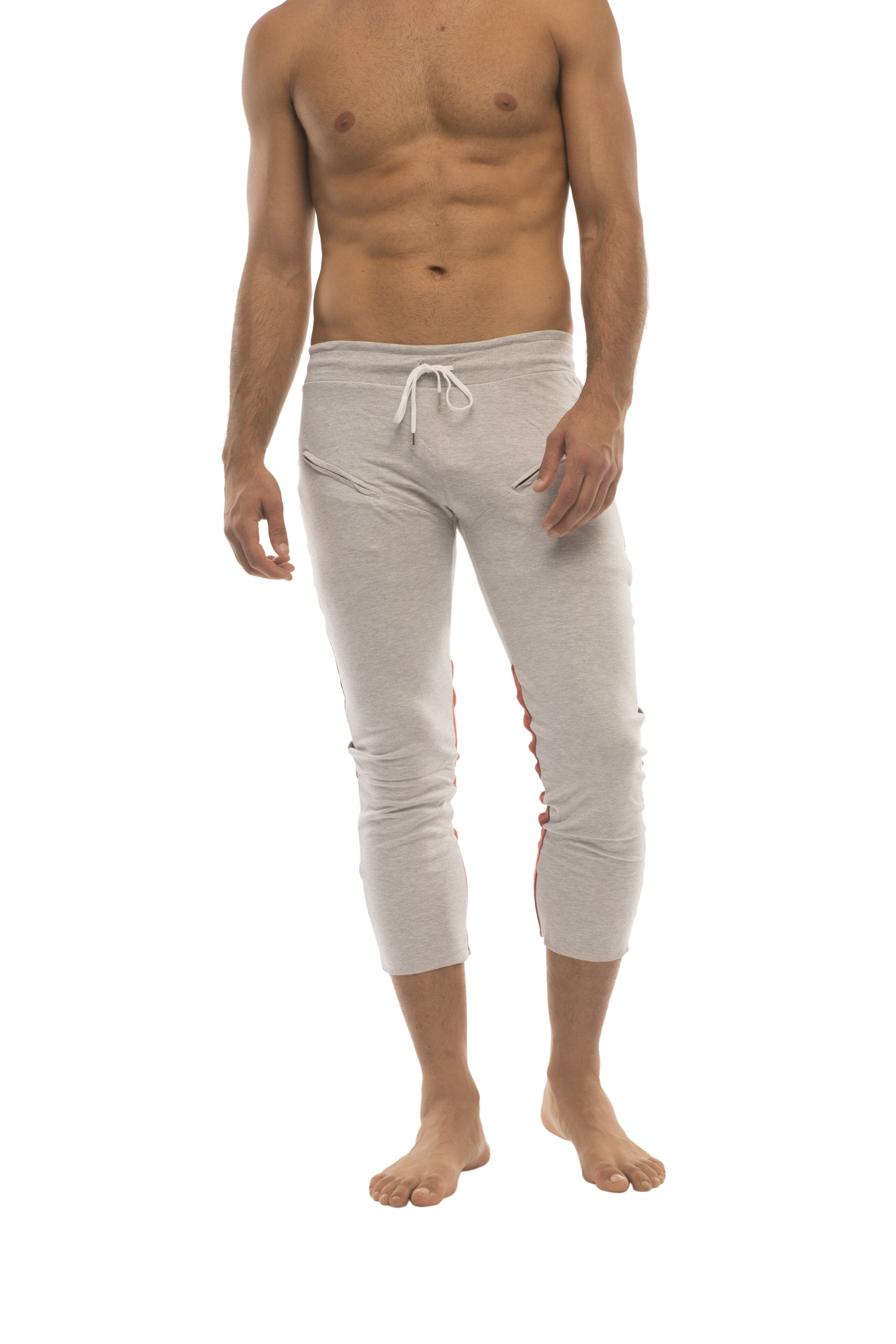 Mens grey capri yoga pants with white drawstring waistband and red side stripes featuring 45 zipper pockets