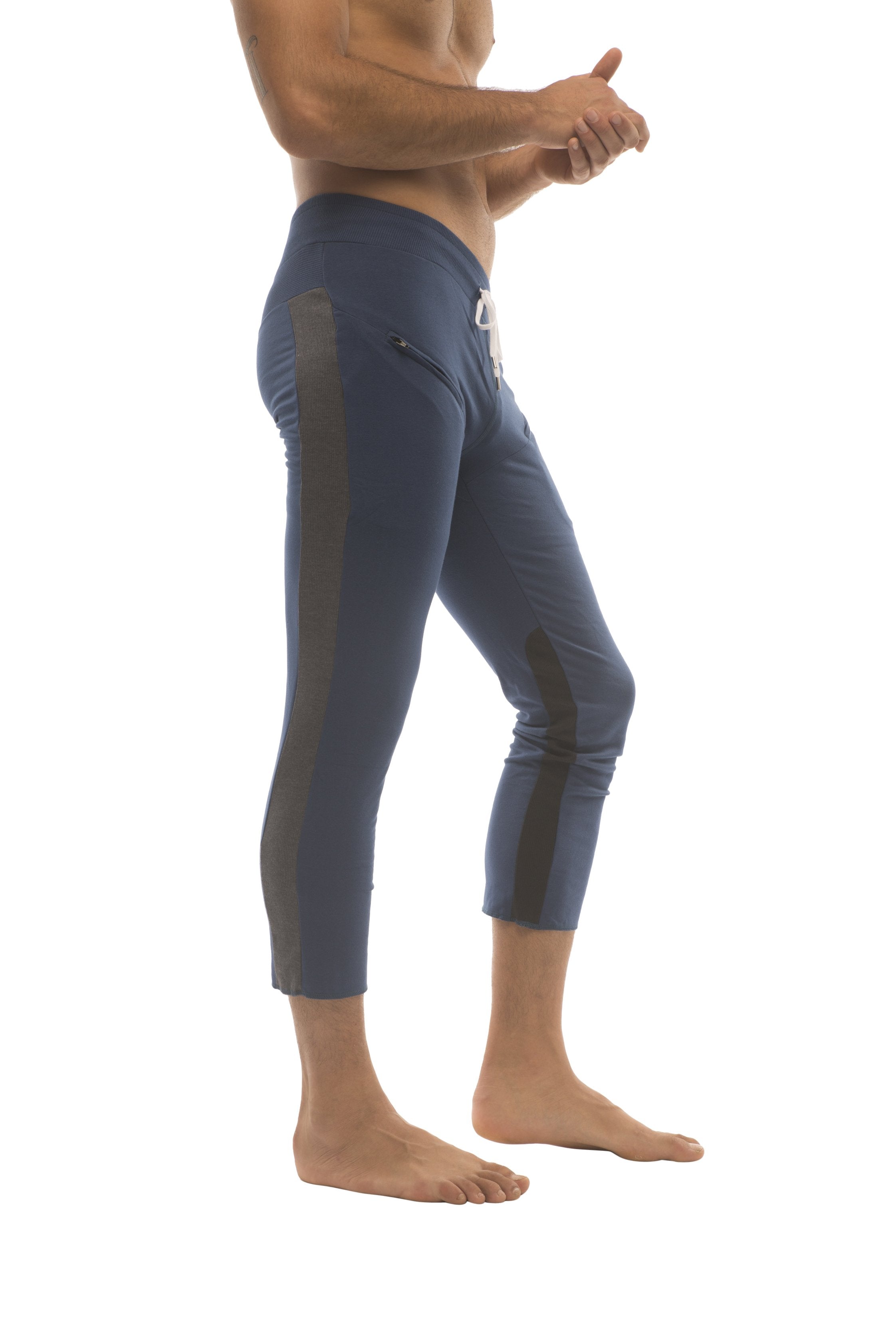 Mens 4 5 zipper pocket capri yoga pants in royal navy with charcoal black side panels and white drawstring waistband