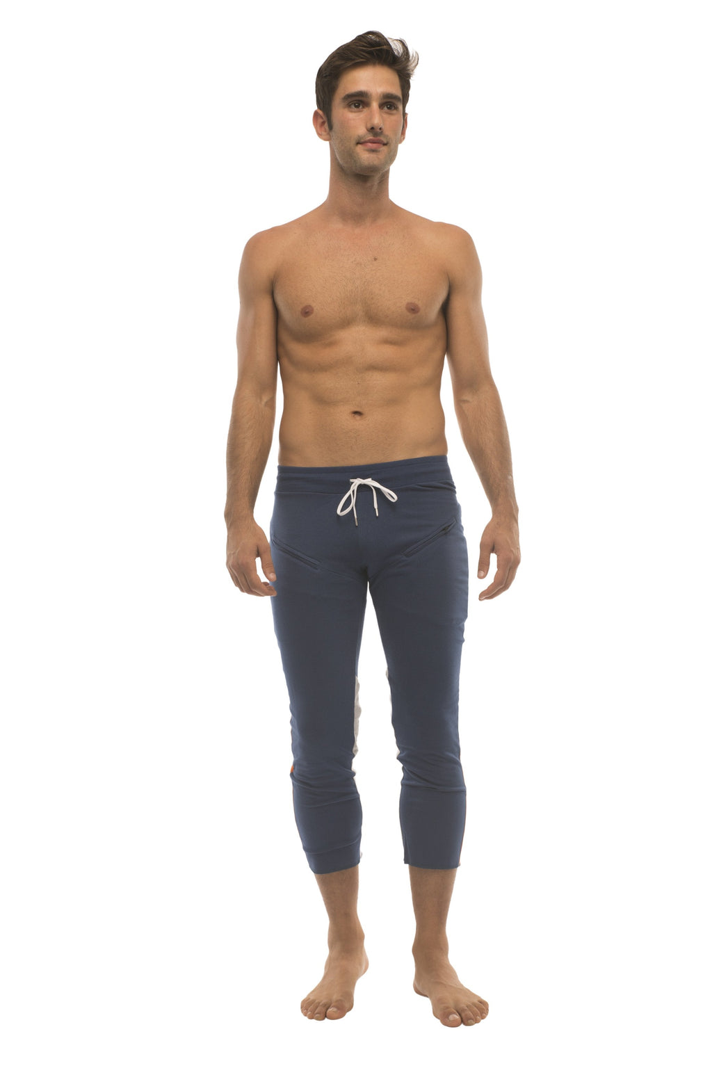 Mens navy blue capri yoga pants with white drawstring waistband and zipper pockets for active wear