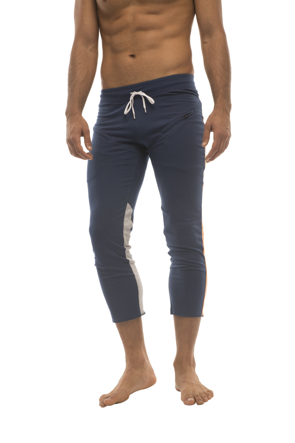 Mens 4/5 zipper pocket capri yoga pants in navy blue with white side stripes and matching drawstring waistband