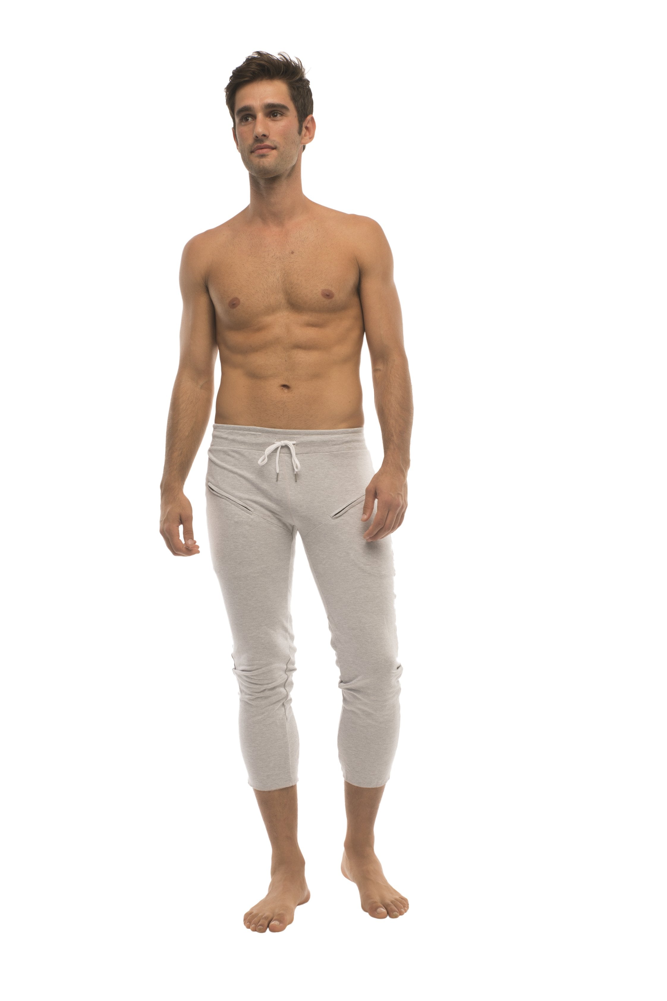 Men’s solid heather grey capri yoga pants with zipper pockets drawstring waist and side pockets in light gray