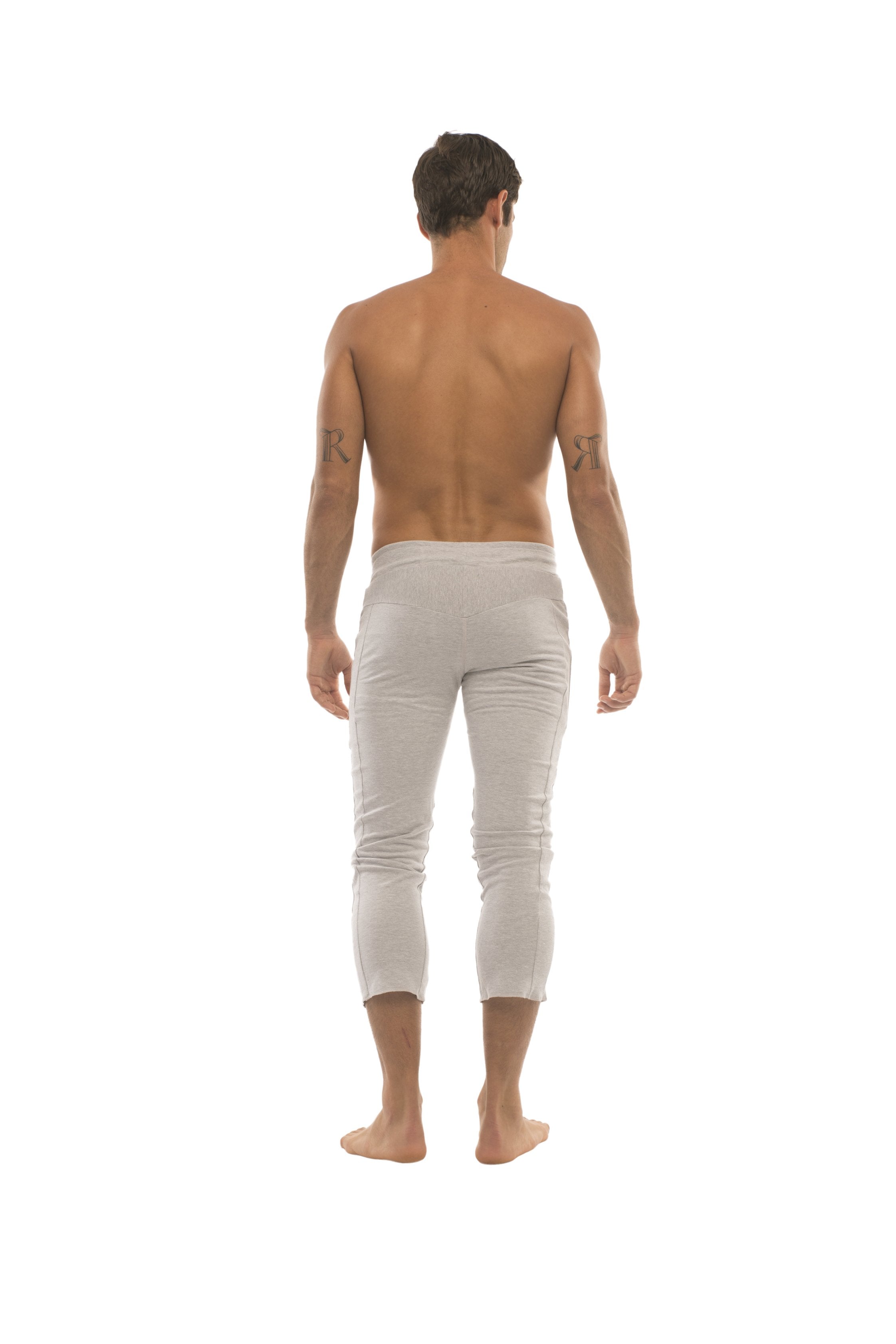 Mens 4/5 zipper pocket capri yoga pants in solid heather grey with slim fit cropped design and subtle stitching details