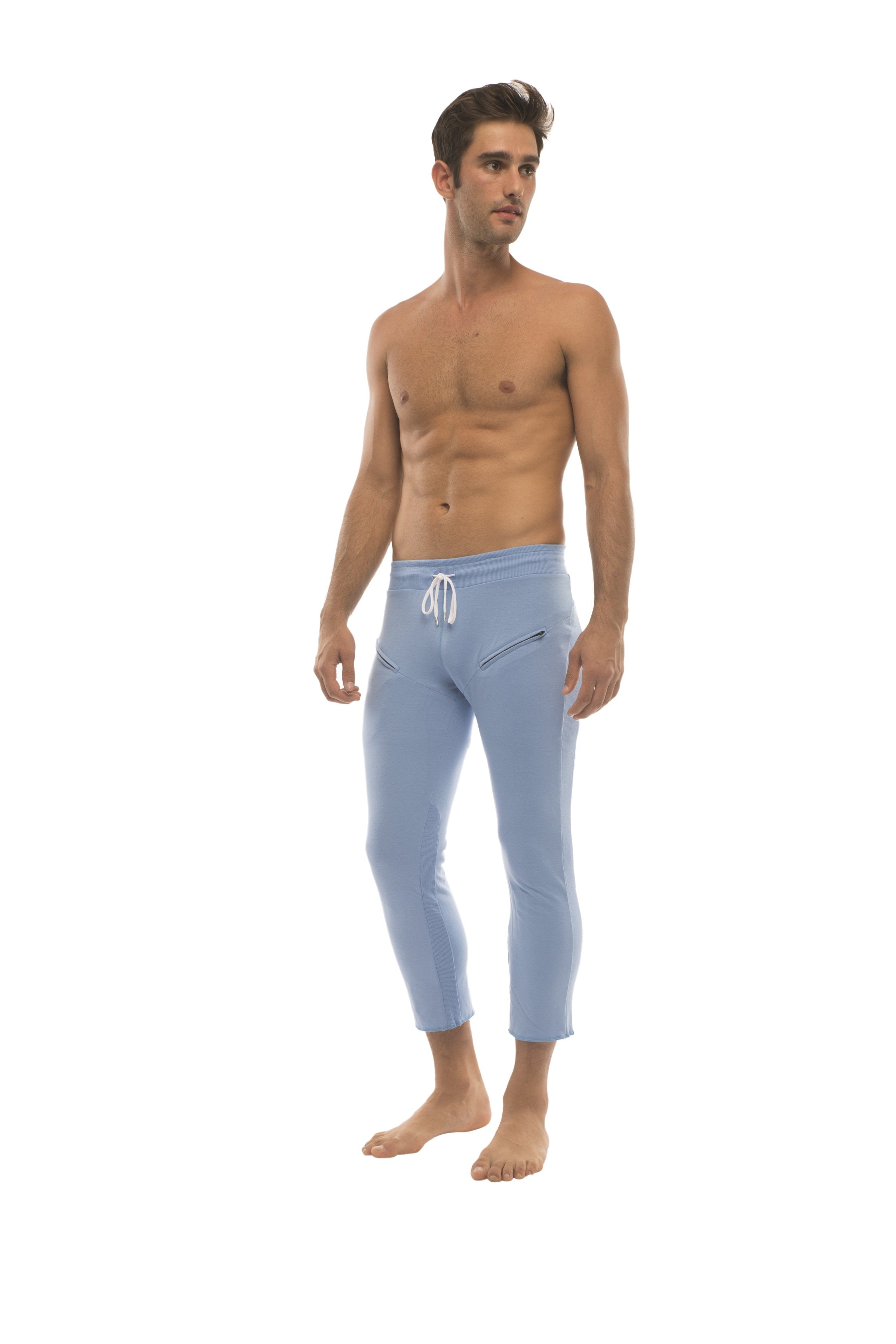 Mens ice blue form-fitting jogger capri yoga pants with white drawstring waistband and subtle side pockets