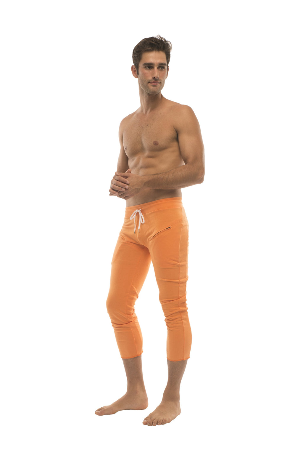 Mens 4/5 zipper pocket solid orange capri yoga pants featuring a white drawstring waistband for comfort