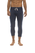Navy blue capri length athletic pants with white drawstring waistband and zipper pockets for men in solid royal blue