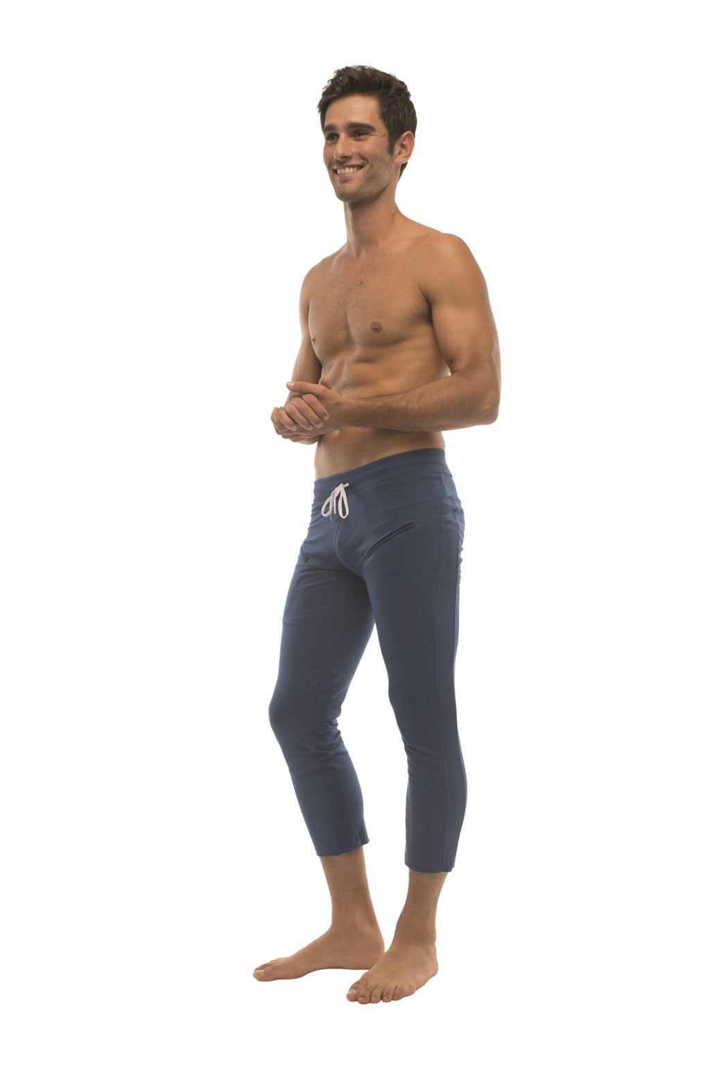 Mens solid royal blue capri yoga pants with white drawstring waistband and zipper pocket for activewear use