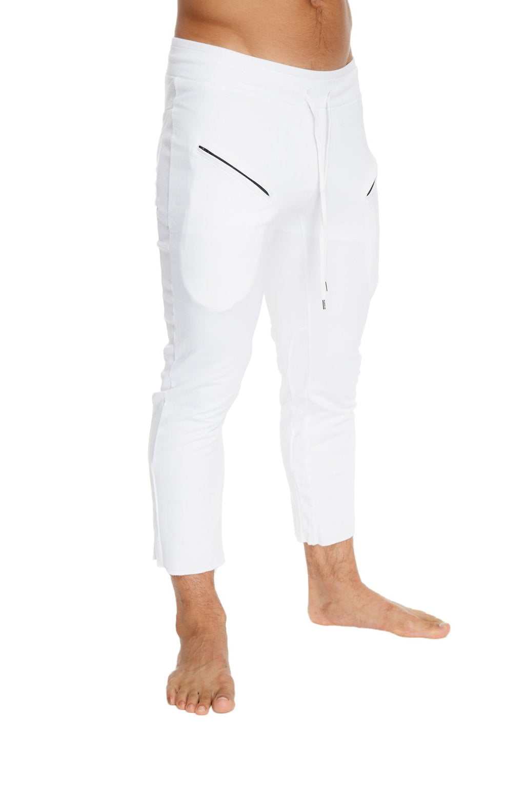 Mens white capri yoga pants with black diagonal zipper pockets and drawstring waistband for athletic use