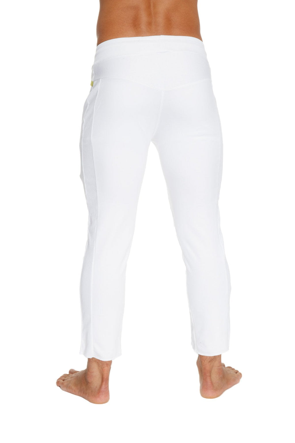 Mens white slim-fit cargo capri yoga pants with 4 5 zipper pockets and yellow logo on back waistband visible