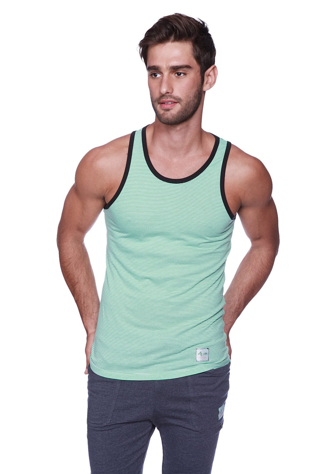 A men’s mint green and black striped tank top with ribbed neckline paired with black and green cuffed yoga pants