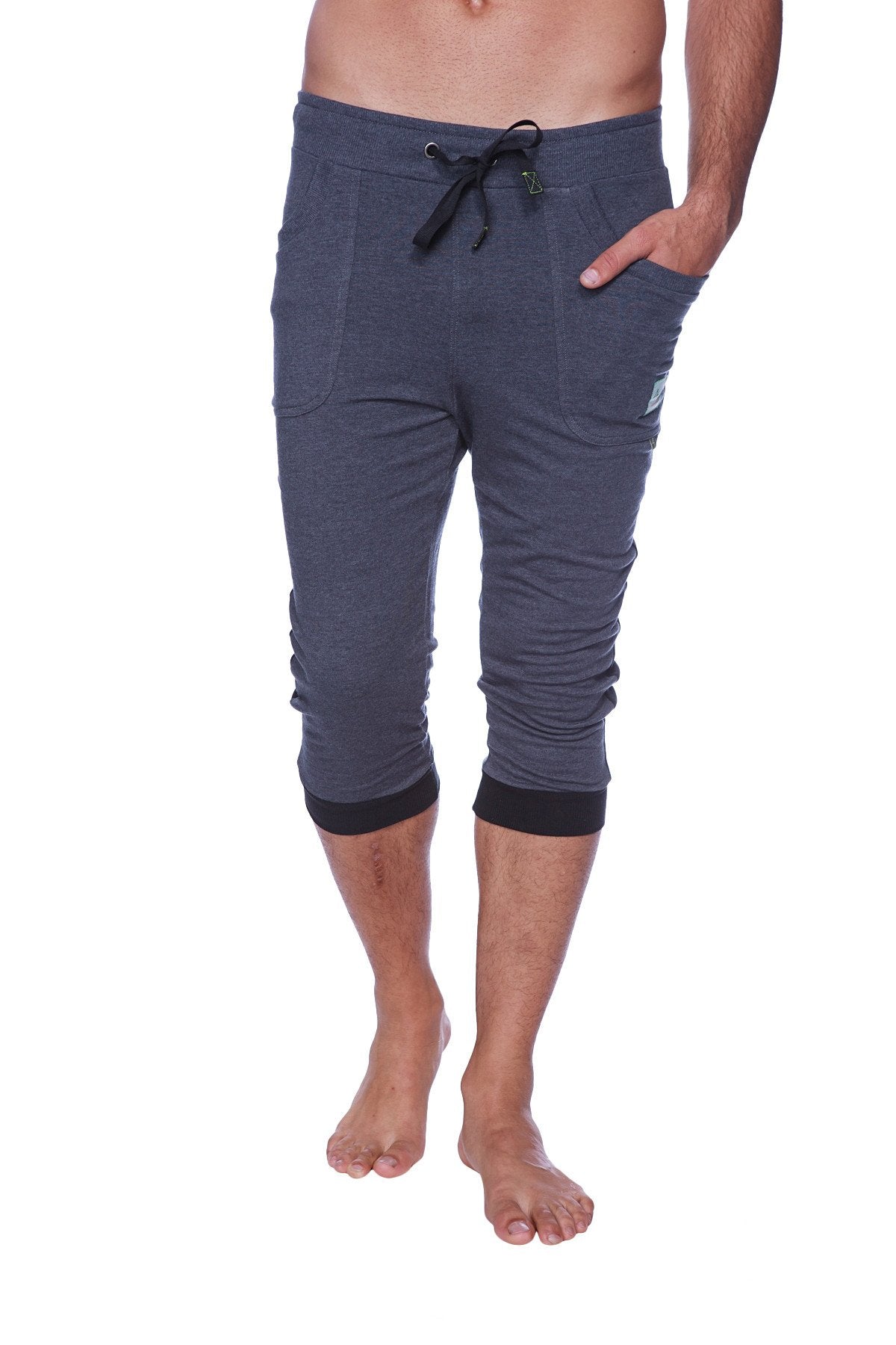 Mens cuffed yoga pants in charcoal heathered gray with black drawstring waistband and contrasting black cuffs