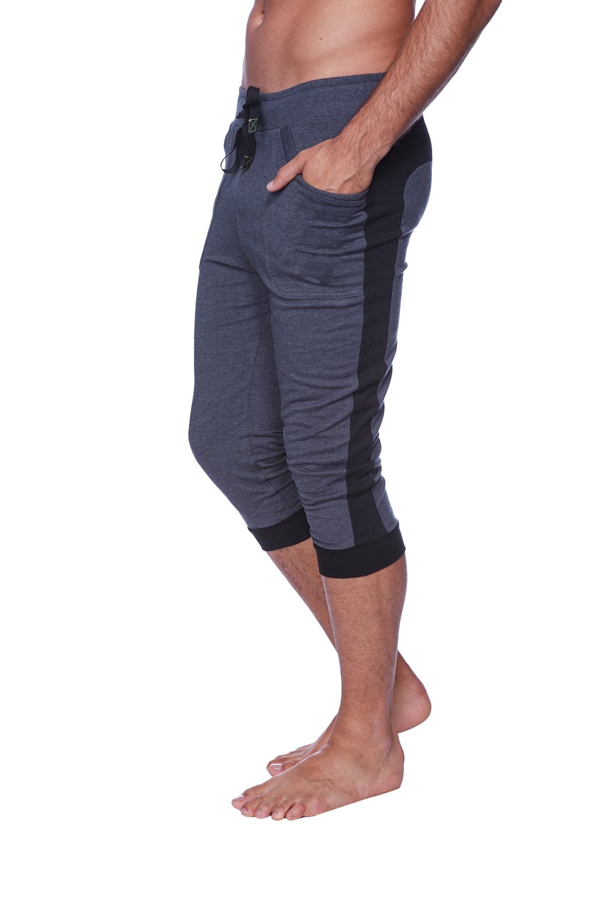 Mens cuffed yoga pants in charcoal with black side panels dark gray capri-length joggers with elastic cuffs