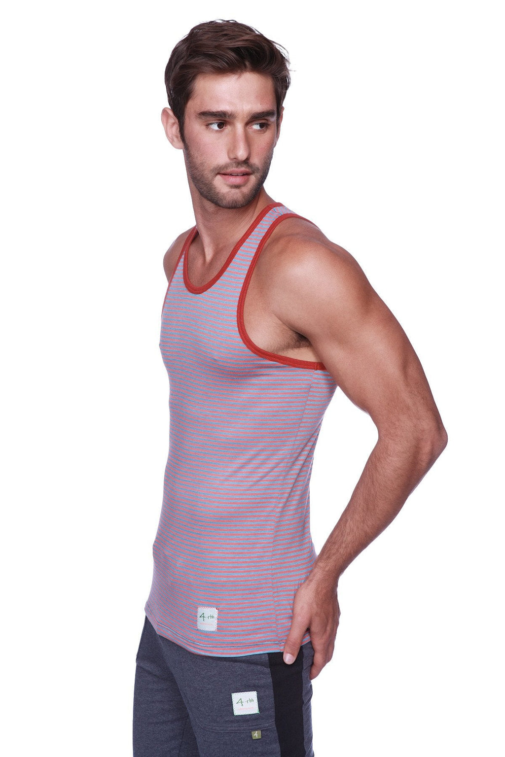 Mens light purple tank top with thin red stripes and red trim shown with mens cuffed yoga pants charcoal with black
