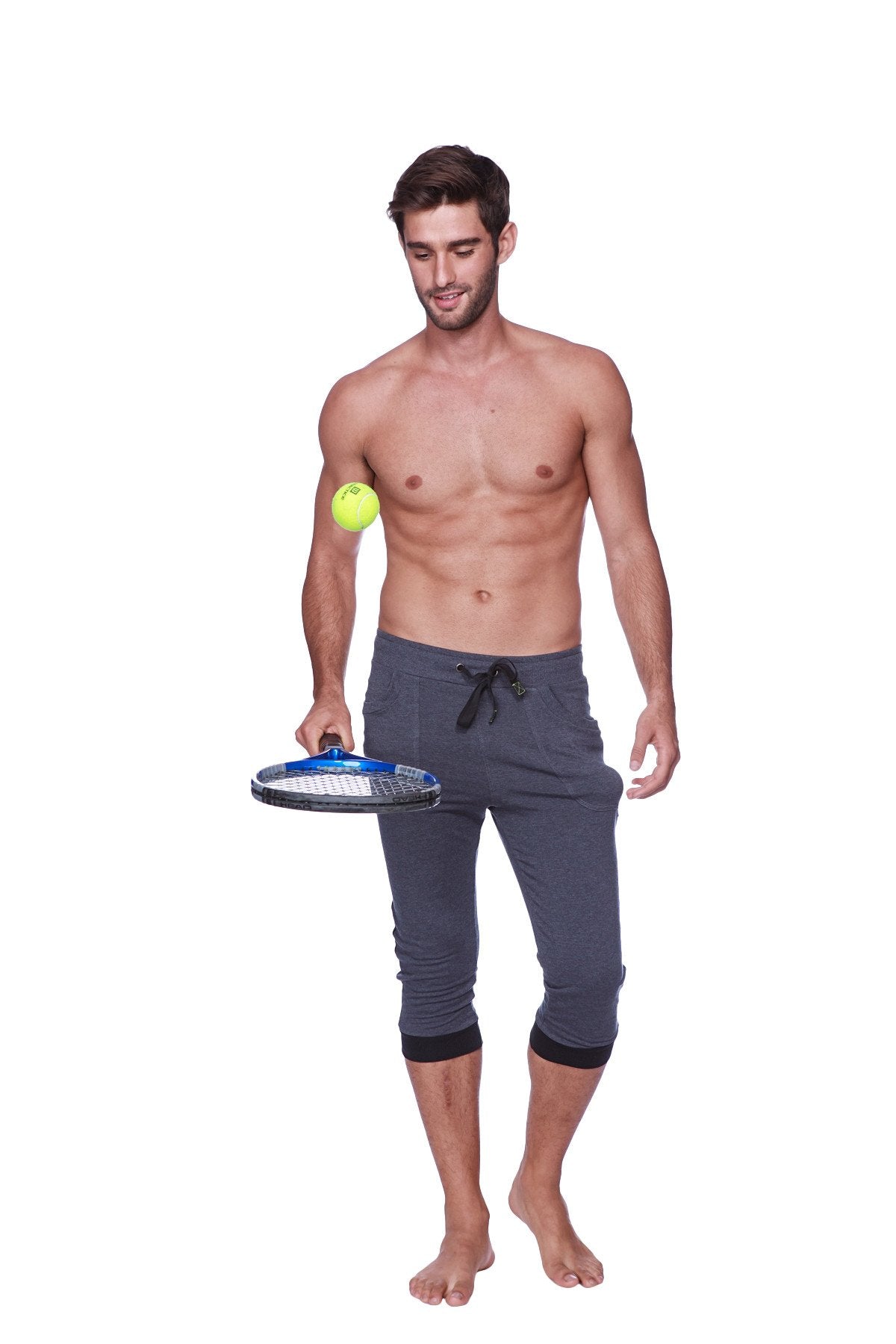 Mens cuffed yoga pants in charcoal with black drawstring elastic cuffs and gray athletic fabric for comfortable workouts