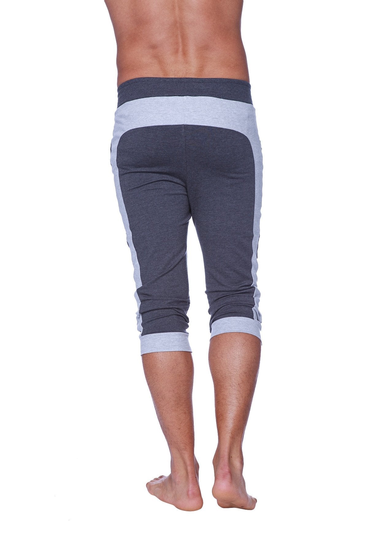 Mens cuffed yoga pants in charcoal and heather grey stripes made of soft stretchy fabric for comfortable wear