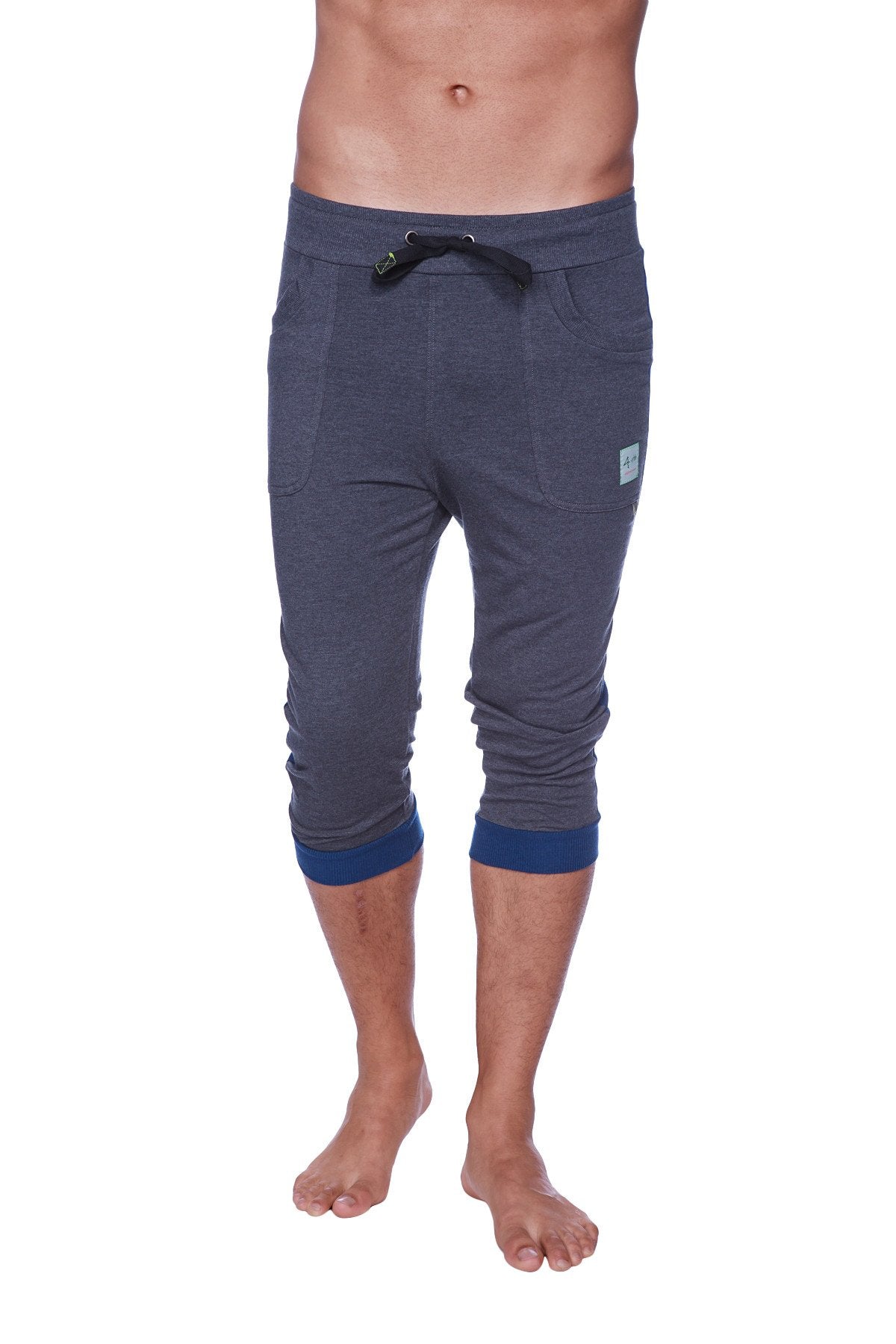 Mens cuffed yoga pants in dark gray heather with contrasting navy blue cuffs and waistband trim for comfort and style