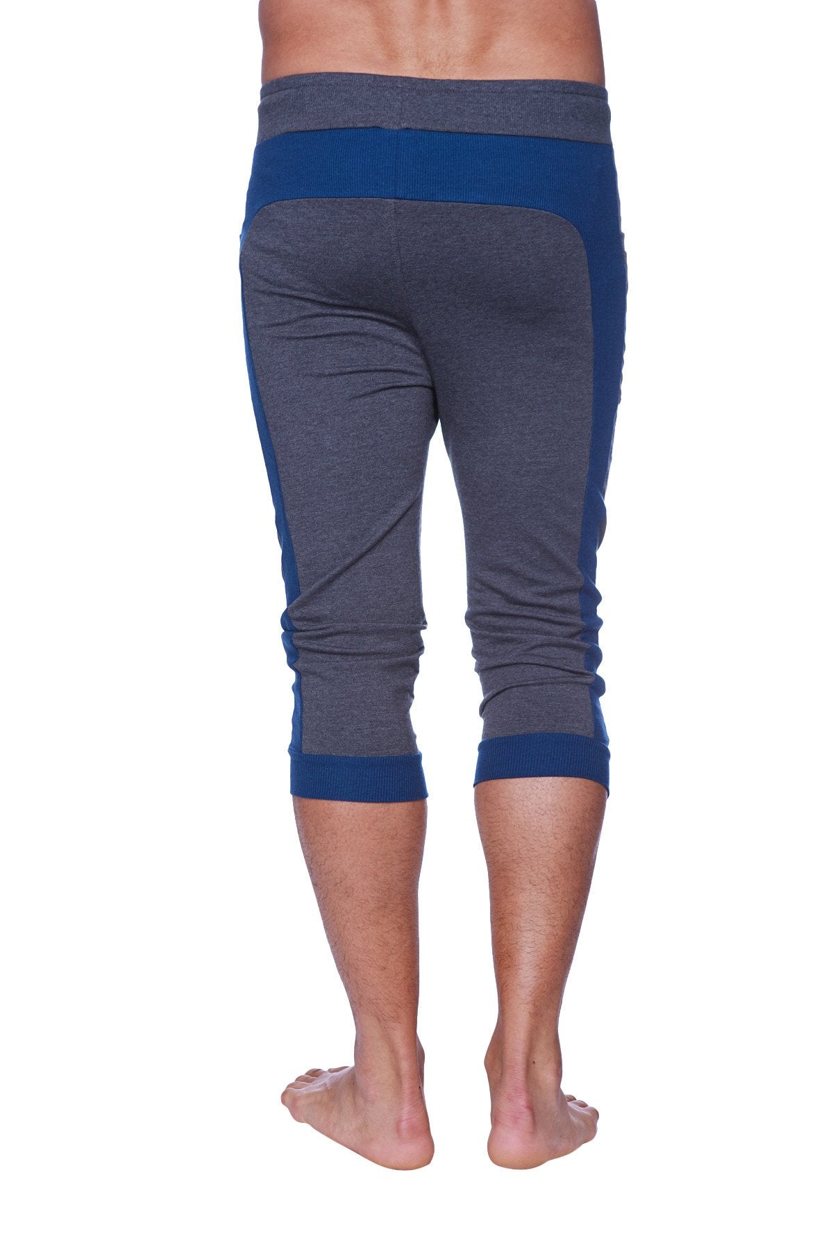 Mens cuffed yoga pants in charcoal and royal blue with ribbed cuffs and waistband for athletic use