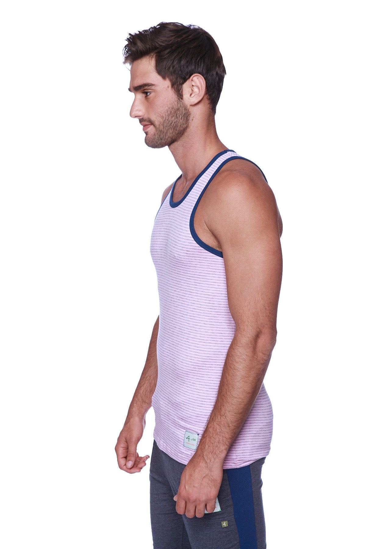 A light purple and white striped tank top with navy blue trim paired with charcoal mens cuffed yoga pants with royal blue accents