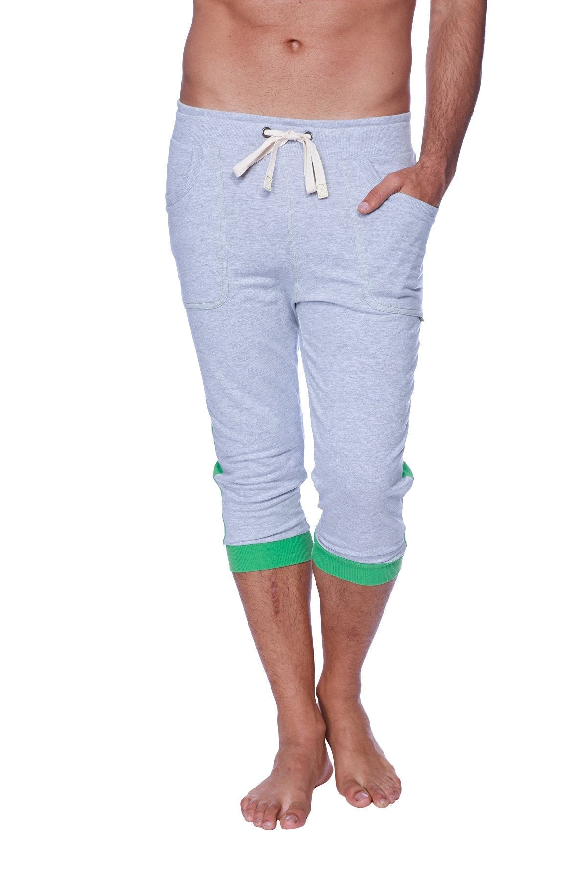 Mens cuffed yoga pants in light gray heather with green cuffs and white drawstring waistband for active wear