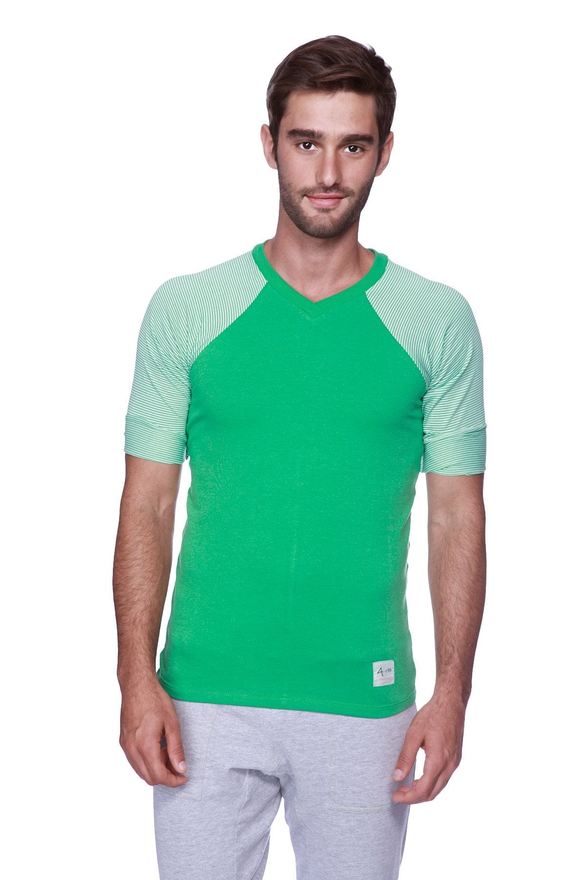 Green v-neck t-shirt with light green striped raglan sleeves paired with mens heather grey cuffed yoga pants with green detailing