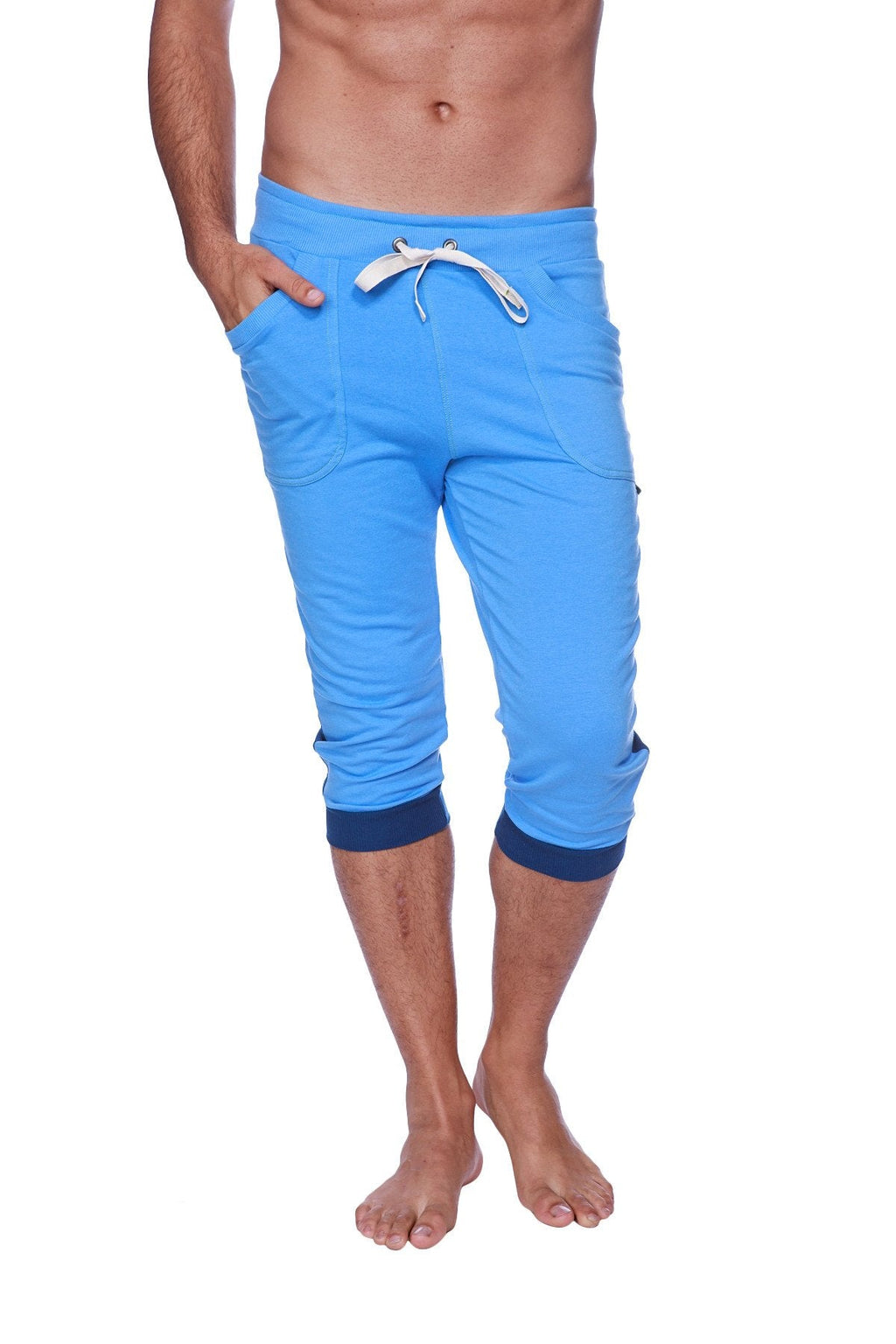 Mens cuffed yoga pants in bright blue with navy cuffs and white drawstring waistband for comfortable workouts