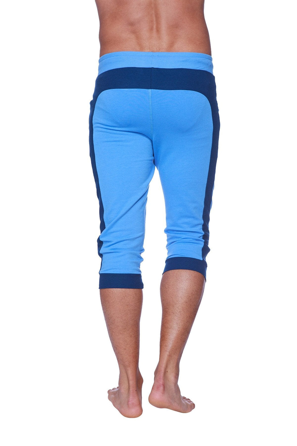 Mens cuffed yoga pants in ice blue with royal blue stripes featuring a contrasting side stripe for athletic use
