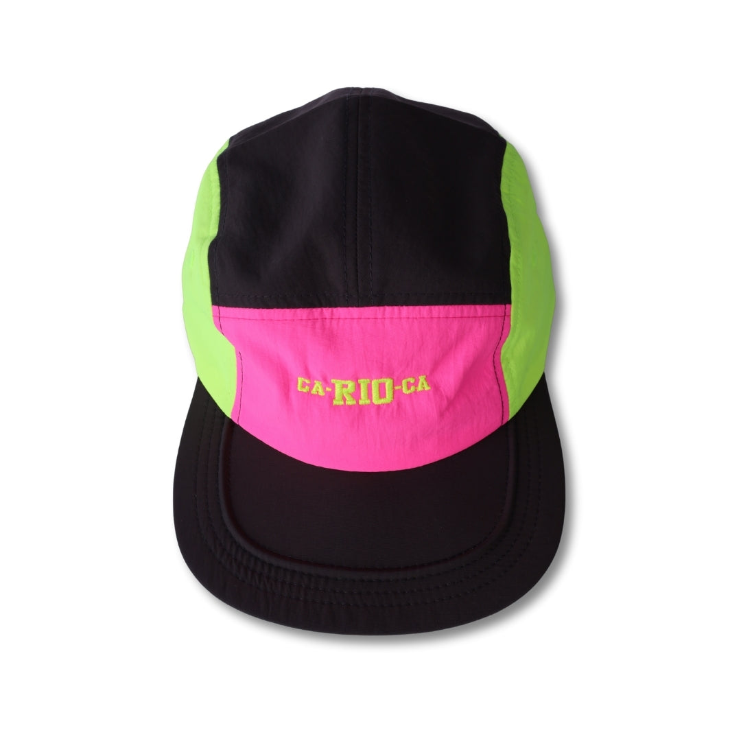 Neon dream bike cap hat in vibrant neon green and pink with black brim and yellow ca-rio-ca embroidery on front panel